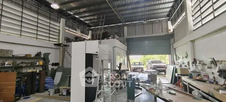 Spacious industrial warehouse with high ceilings and ample storage space