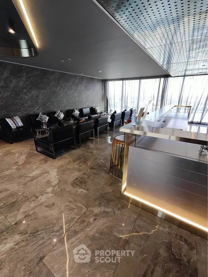 Luxurious modern living room with sleek marble flooring and elegant seating area.