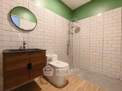 Modern bathroom with stylish vanity and open shower design