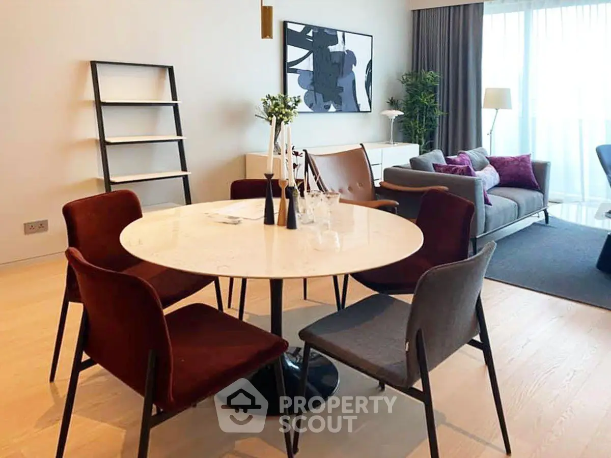 Modern living room with stylish dining area and contemporary decor