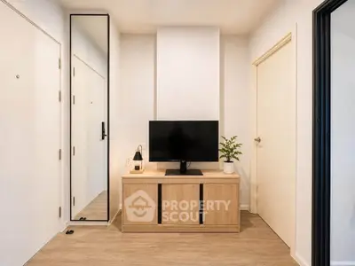 Modern living room with sleek TV stand and minimalist decor