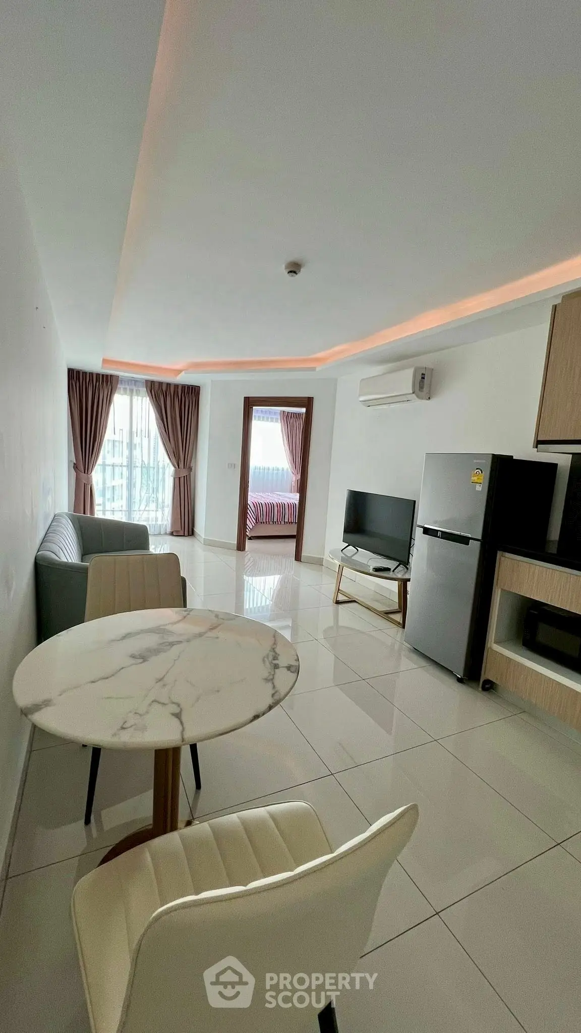 Modern living room with sleek furniture and open layout in a stylish apartment