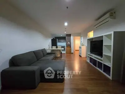 Spacious modern living room with sleek furniture and open layout