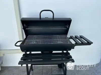 Modern outdoor BBQ grill on a stylish patio setting