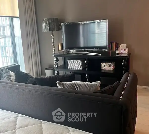 Stylish living room with modern TV setup and elegant decor