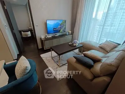 Modern living room with stylish furniture and large window view