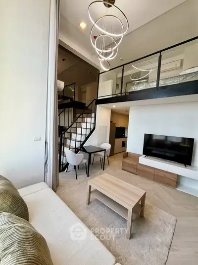 Modern loft apartment with stylish living room and mezzanine bedroom