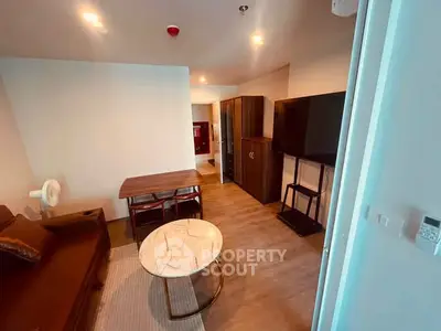 Modern living room with stylish furniture and open layout, perfect for urban living.