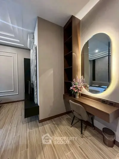 Stylish bedroom with modern vanity and elegant decor