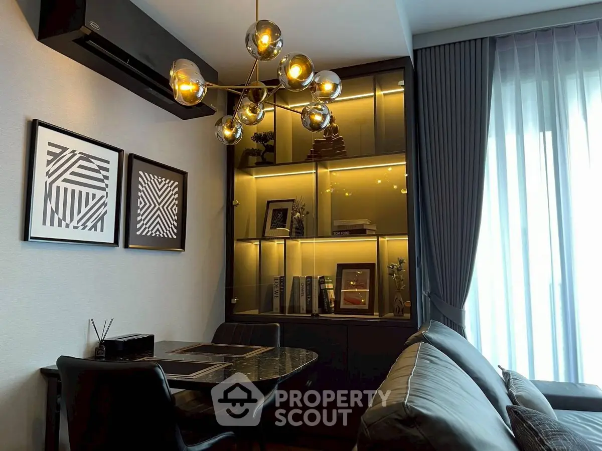 Stylish modern living room with elegant lighting and cozy seating area