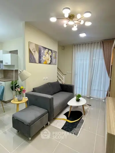 Modern living room with stylish decor and cozy seating area
