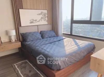 Luxurious bedroom with stunning city view and elegant decor