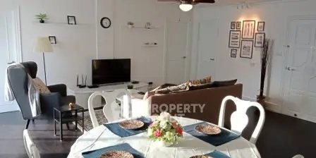 Spacious living room with elegant dining area and modern decor