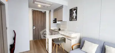 Modern compact living room with integrated kitchen and stylish decor