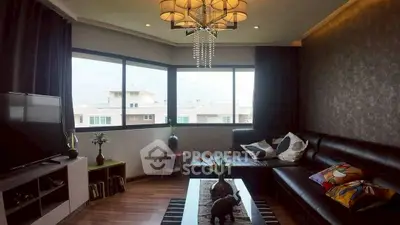 Stylish living room with large windows and modern decor