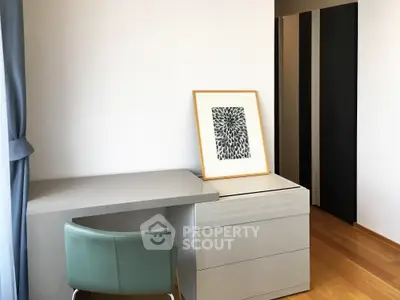 Modern study room with sleek desk and stylish chair, perfect for productivity and creativity.