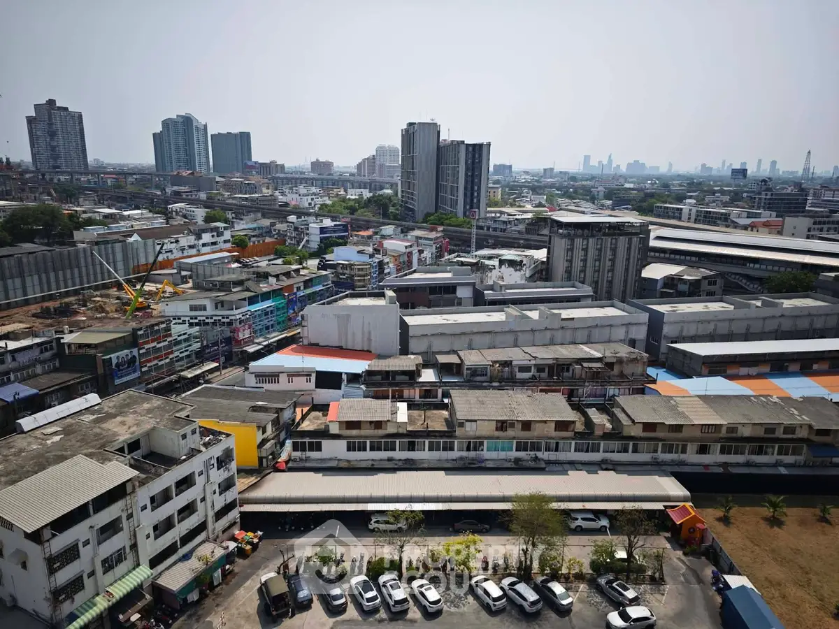 Panoramic cityscape view showcasing diverse urban architecture and skyline.