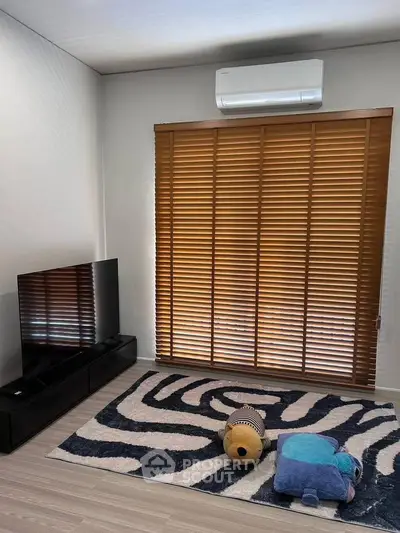 Modern living room with air conditioning and stylish decor