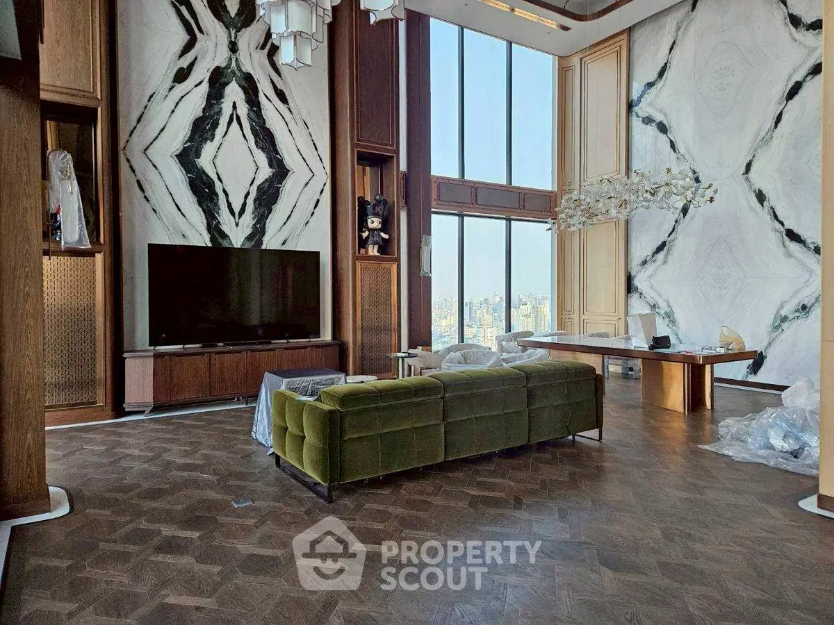 Luxurious high-rise living room with floor-to-ceiling windows and modern decor