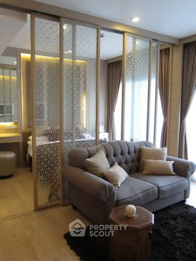 Luxurious living room with elegant decor and sliding partition in modern apartment