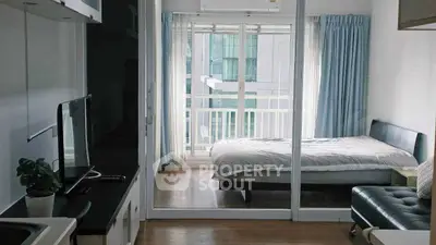 Modern studio apartment with balcony and sleek interior design