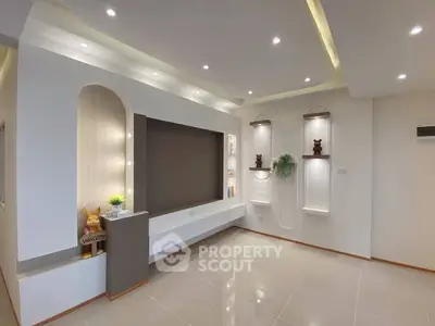 Modern living room with elegant lighting and stylish decor