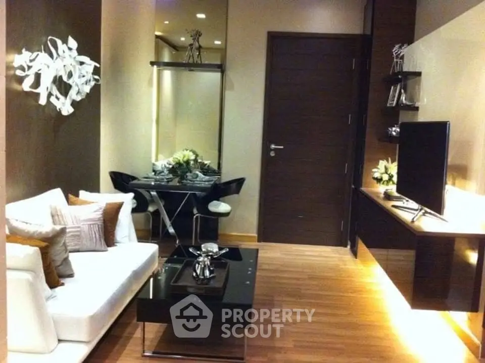 Stylish modern living room with elegant decor and sleek furniture, perfect for urban living.