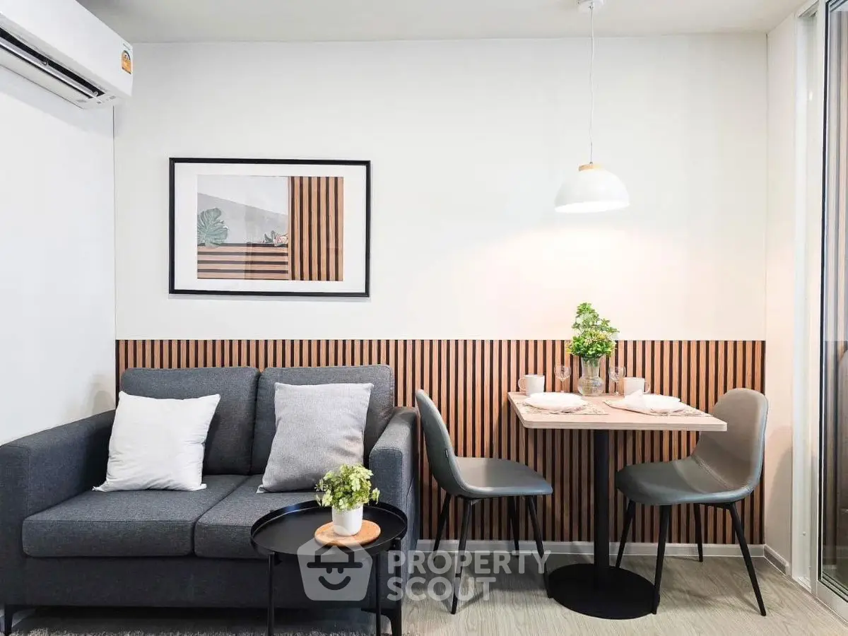 Modern living room with stylish decor and cozy dining area