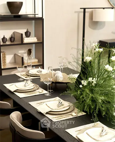Elegant dining room with modern decor and lush greenery centerpiece