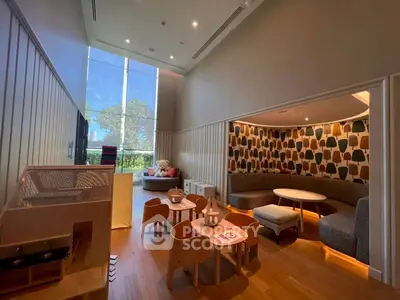 Spacious modern living room with high ceilings and stylish decor, perfect for family gatherings.