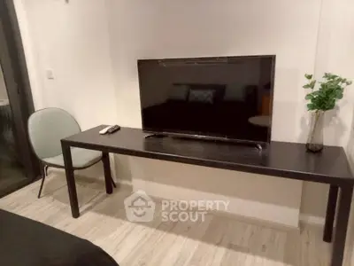 Modern living room with sleek TV setup and stylish decor