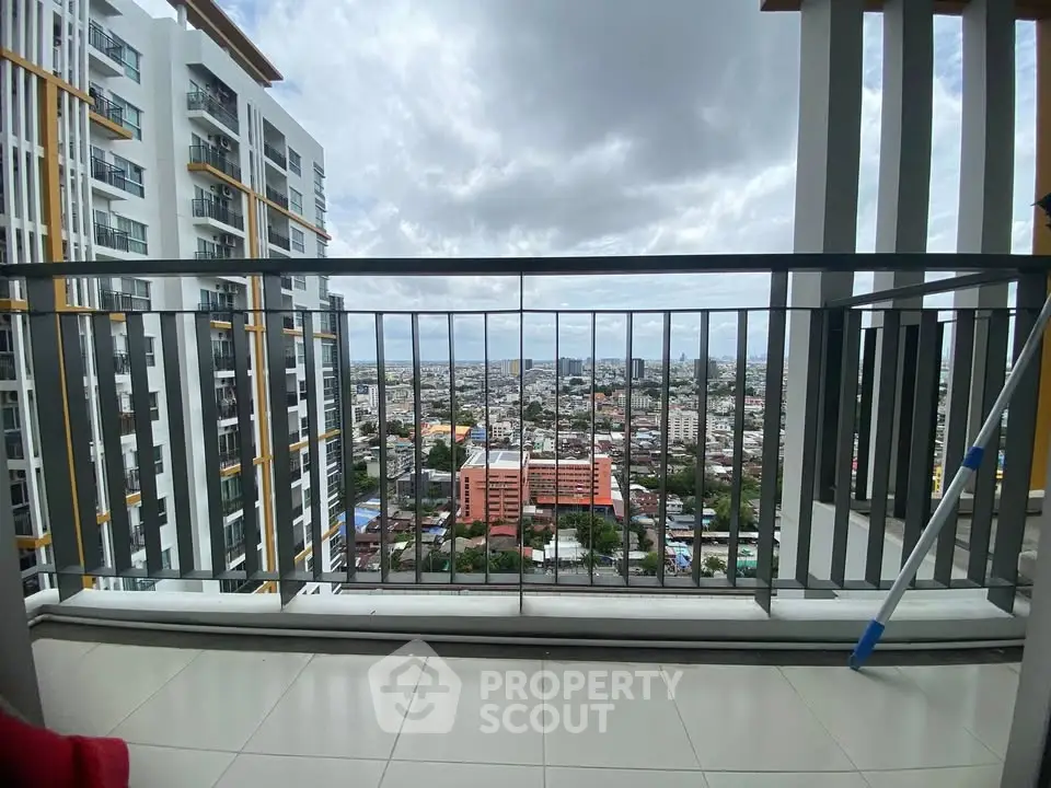 Stunning cityscape view from a modern high-rise balcony, perfect for urban living enthusiasts.
