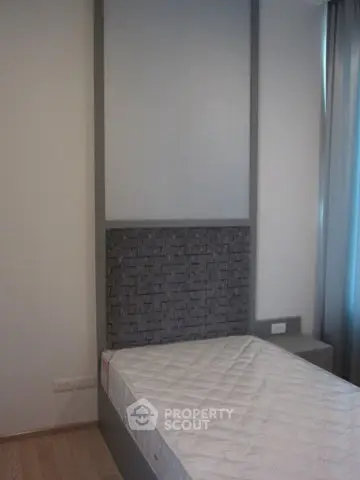 Modern bedroom with minimalist design and stylish headboard