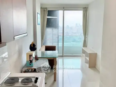 Modern apartment with city view and compact kitchen