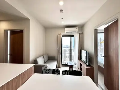 Modern living room with balcony view in a stylish apartment