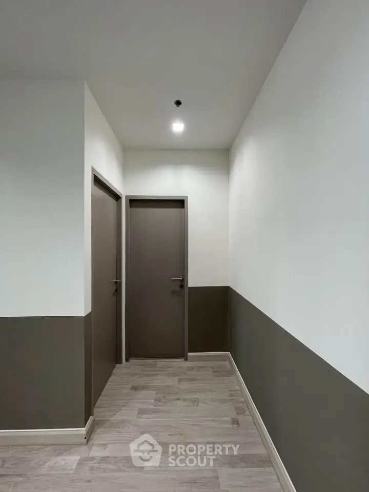 Modern hallway with minimalist design and neutral color palette