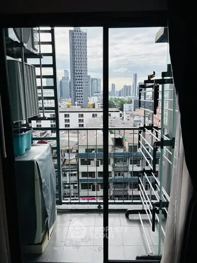 Urban balcony with city skyline view, perfect for enjoying the vibrant cityscape.