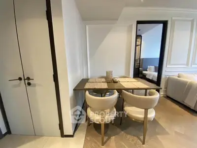 Modern dining area with elegant chairs and table in a stylish apartment