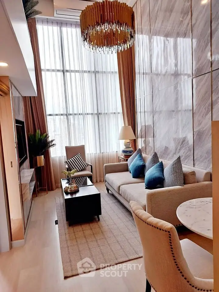 Luxurious modern living room with high ceilings and elegant decor