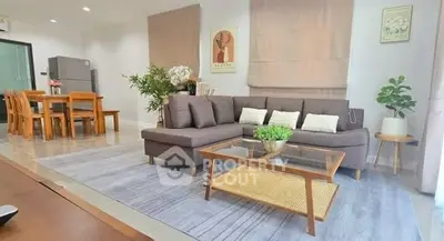 Modern living room with stylish furniture and natural light