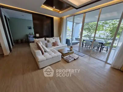 Luxurious living room with spacious balcony and stunning view