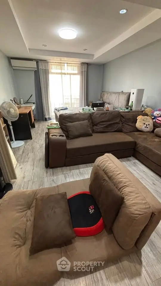 Spacious living room with cozy sectional sofa and modern decor