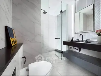 Luxurious modern bathroom with sleek fixtures and elegant marble design