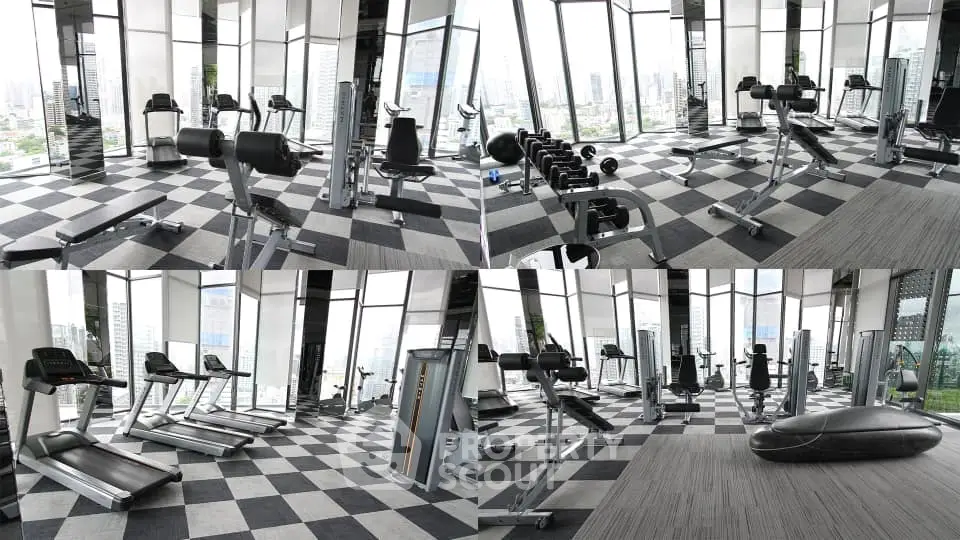 Spacious modern gym with city views and state-of-the-art equipment in luxury building.