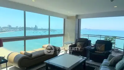 Luxurious living room with panoramic ocean view and stylish furniture