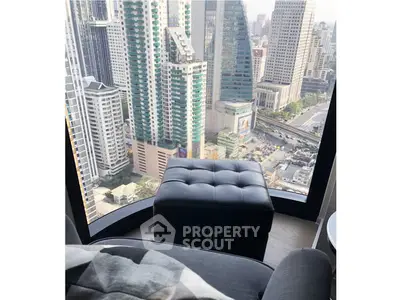 Stunning high-rise city view from a modern apartment with sleek interior design.