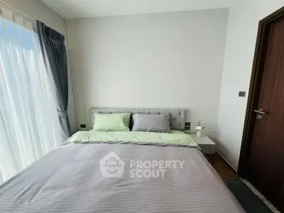 Modern bedroom with elegant decor and natural light