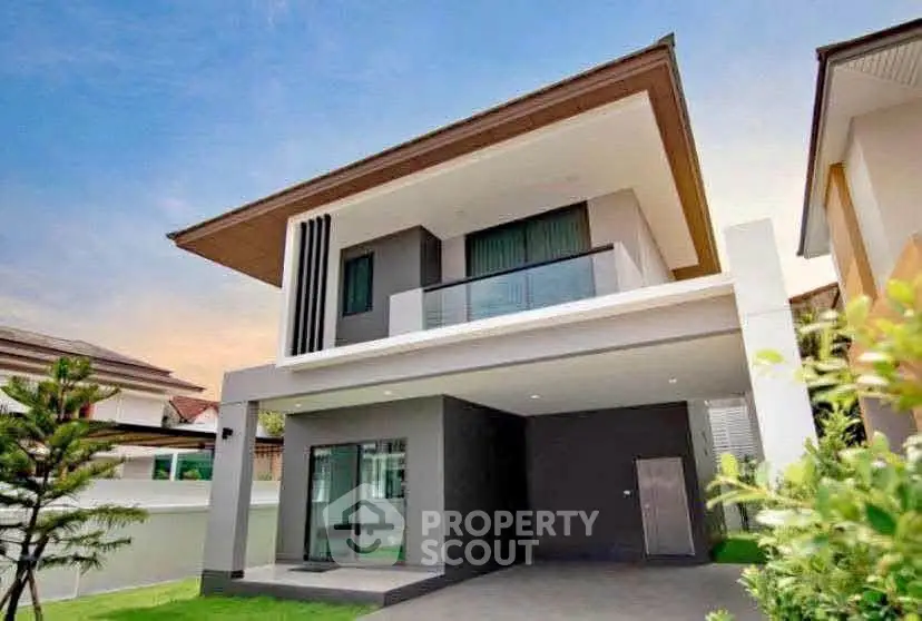Modern two-story house with sleek design and spacious balcony
