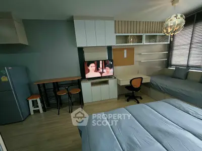 Modern studio apartment with stylish decor and natural light