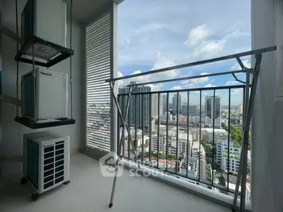 High-rise balcony with stunning cityscape view and air conditioning units.
